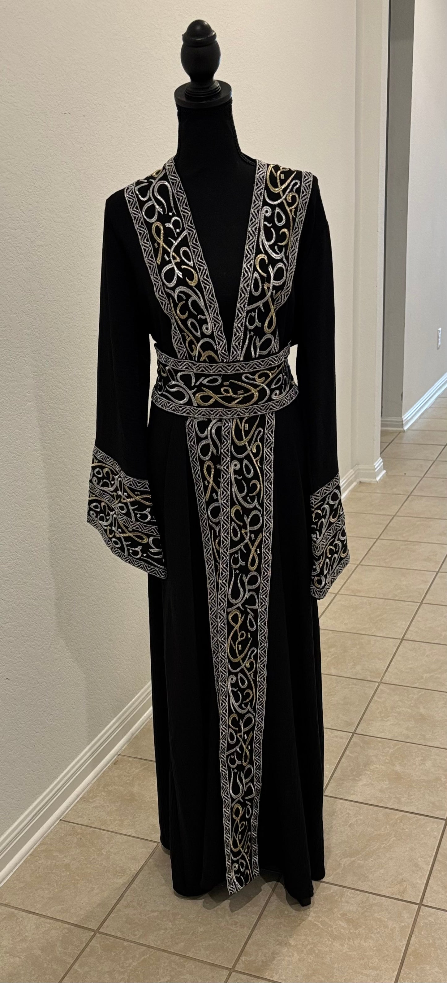 The Queen’s Black Abaya
