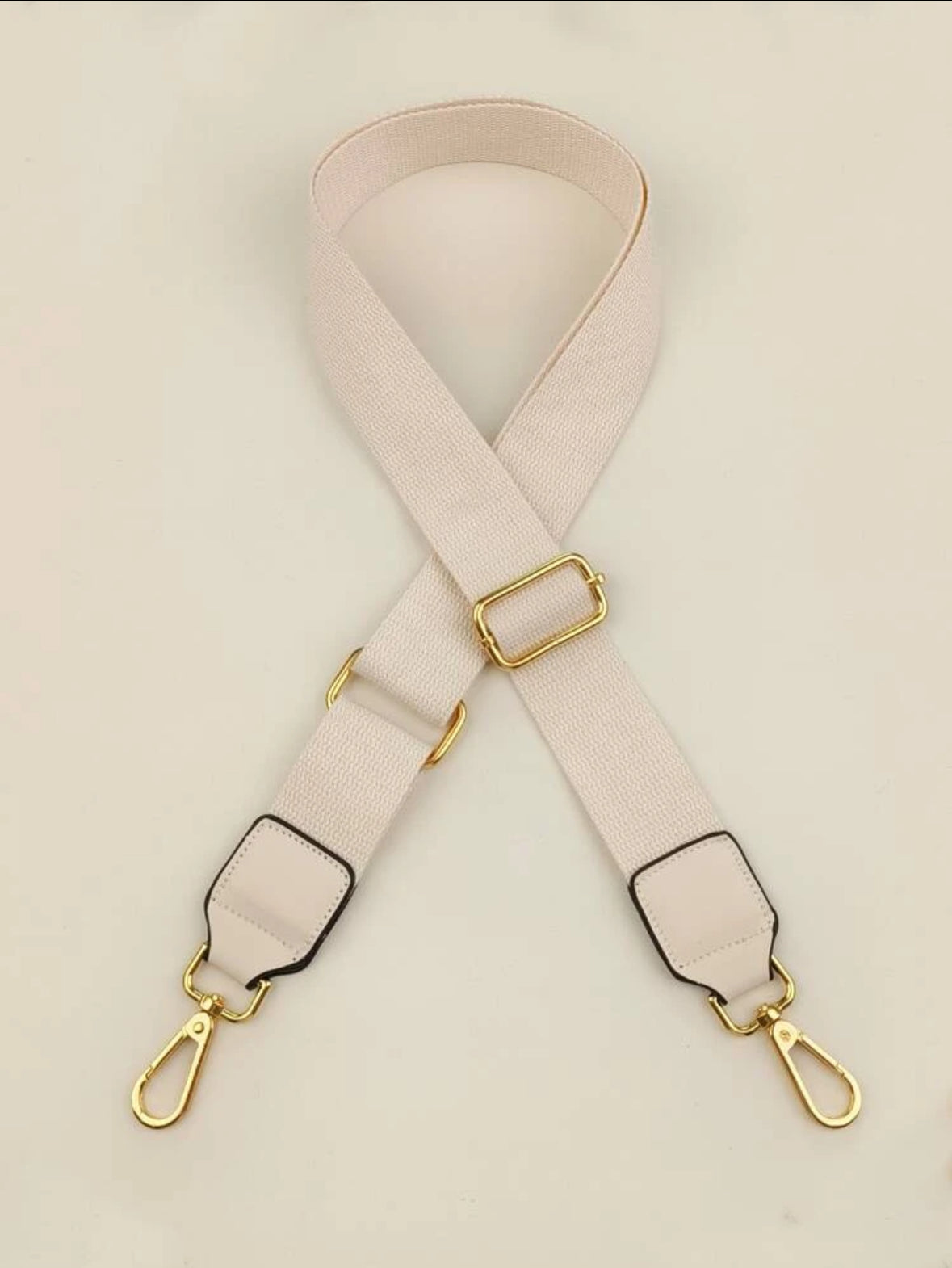 Creamy with leather bagstrap