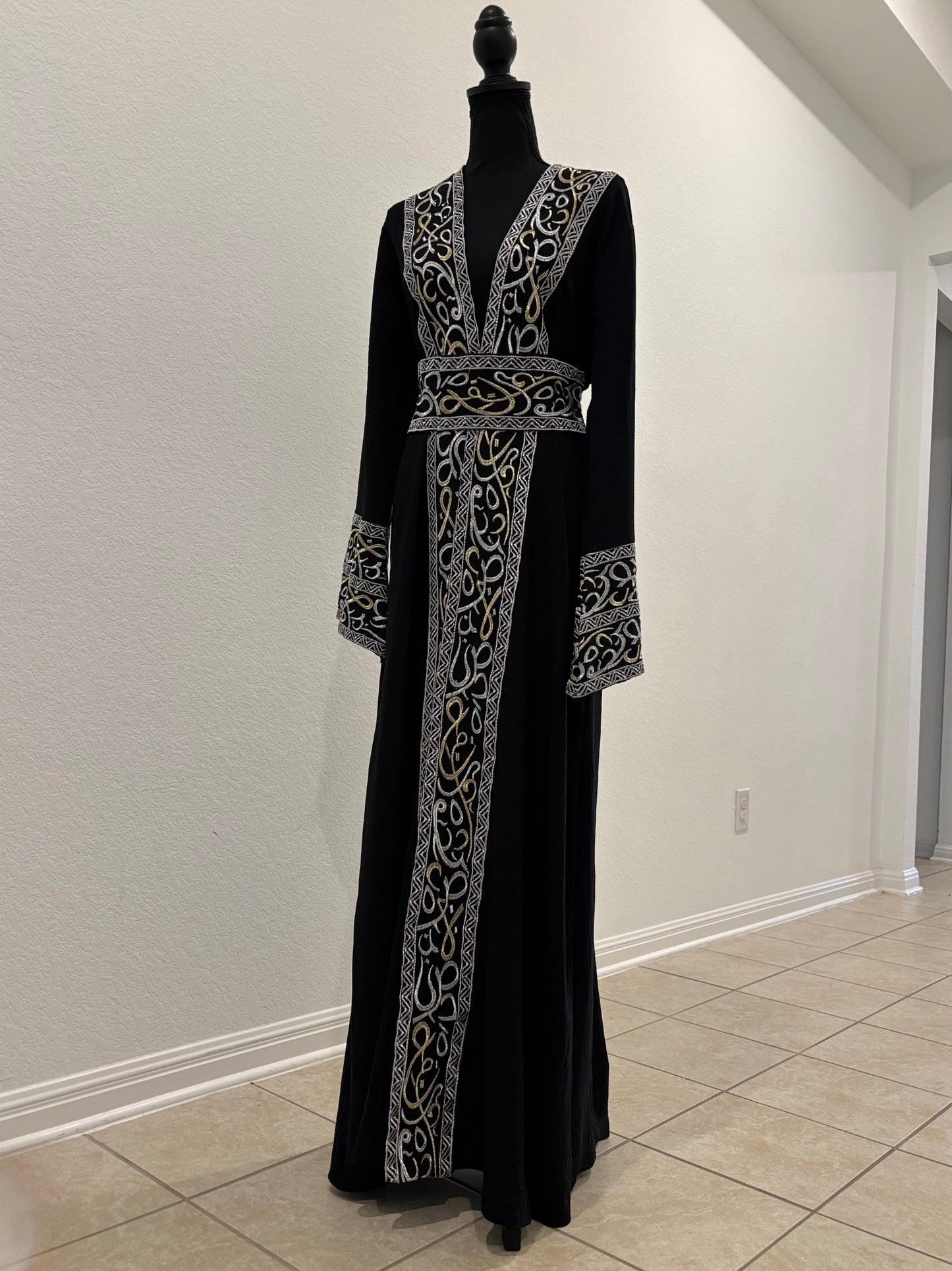 The Queen’s Black Abaya
