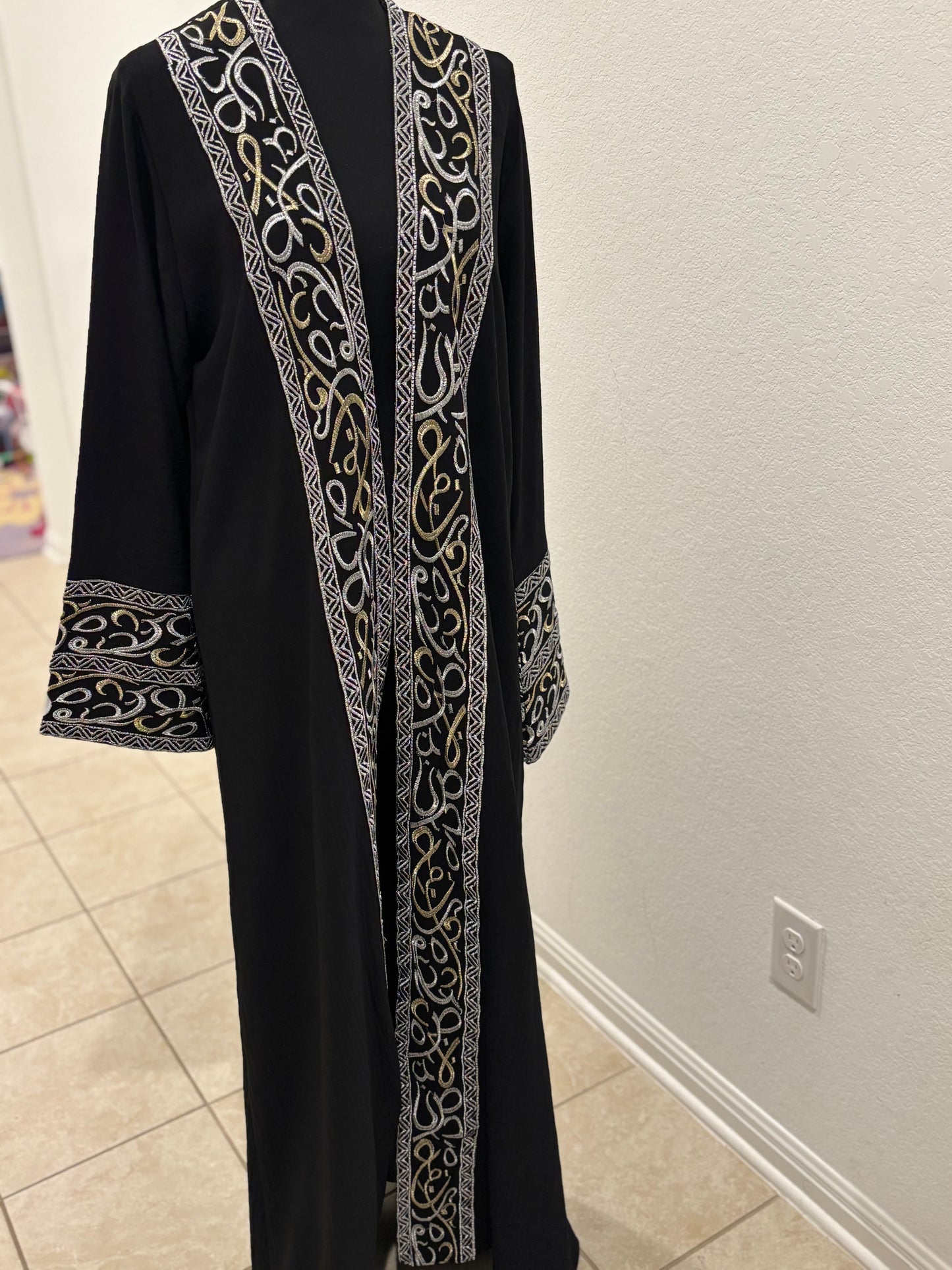 The Queen’s Black Abaya