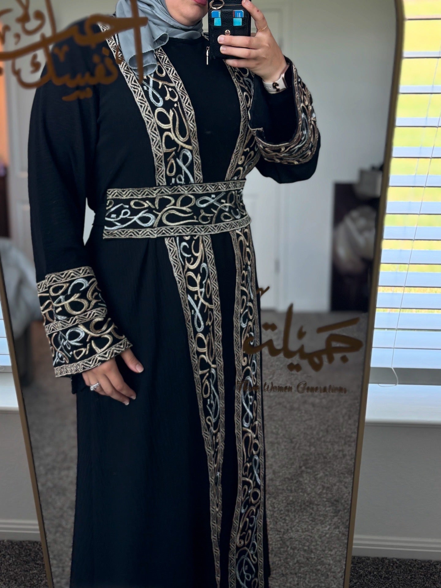 The Queen’s Black Abaya